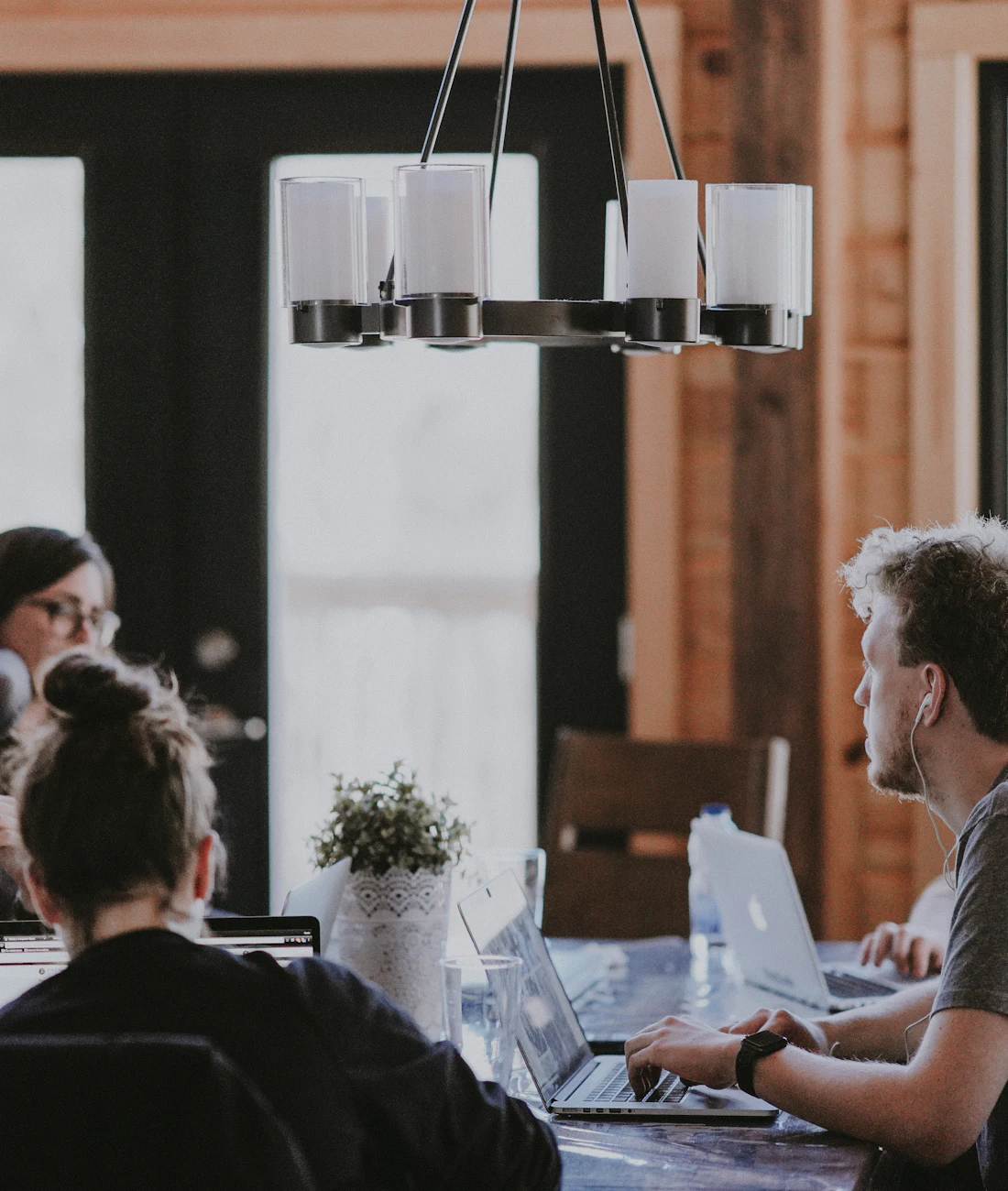 Colleagues working together around a table